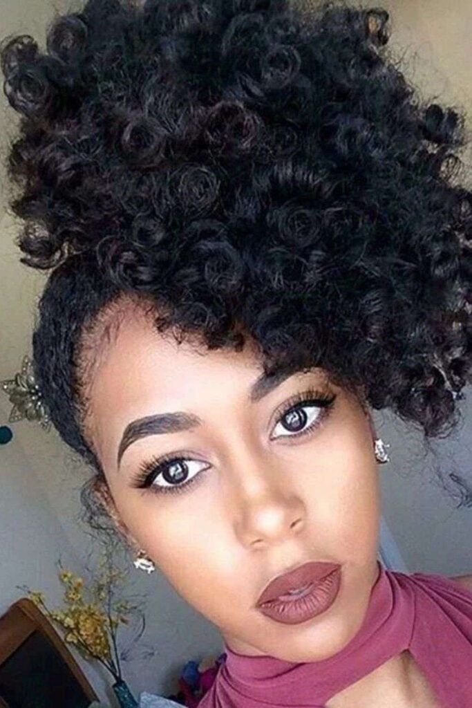 Pineapple hairstyle for curly hair