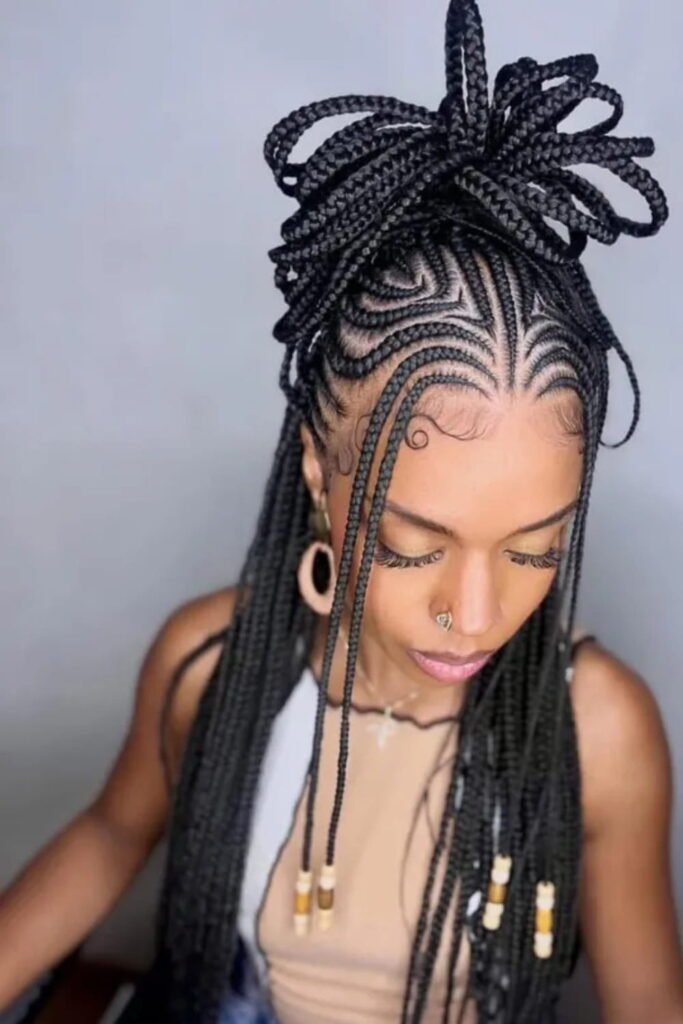 Bun with Hanging Tribal Knotless Braids